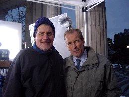 Tommy Cheatham pictured with journalist Peter Jennings on location during a production